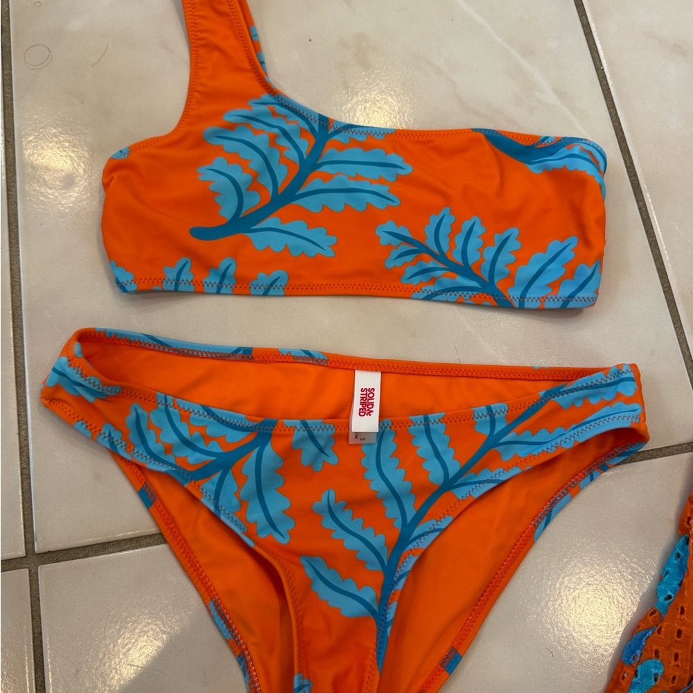 solid and stripe bathing suit set with matching skirt